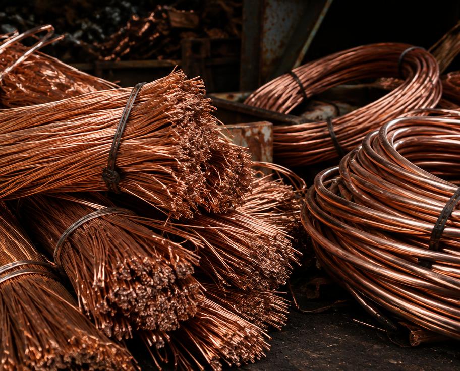Coiled copper wire and stripped copper cable scrap